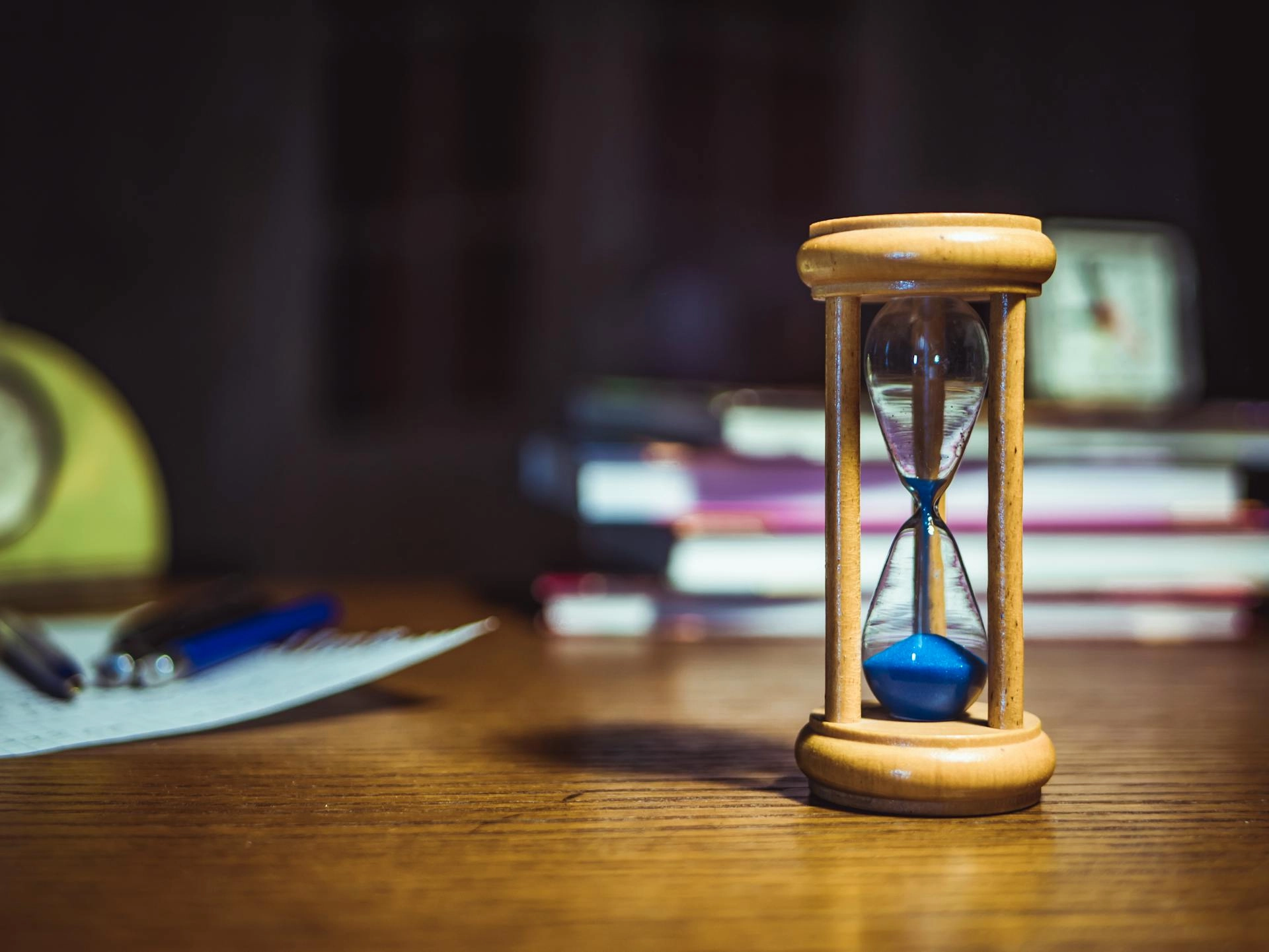Desk with hourglass